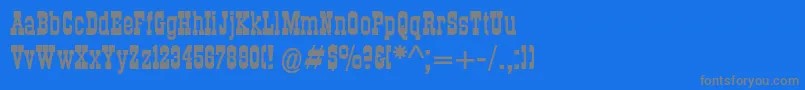 フォントDsroundupbold – 青い背景に灰色の文字