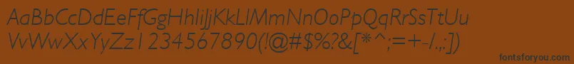 フォントGillSansMtLightItalic – 黒い文字が茶色の背景にあります