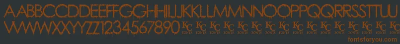 Fonte RainyDayVandaldemo – fontes marrons em um fundo preto