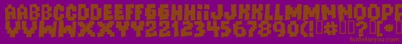 フォントFreaksofnaturemassive – 紫色の背景に茶色のフォント
