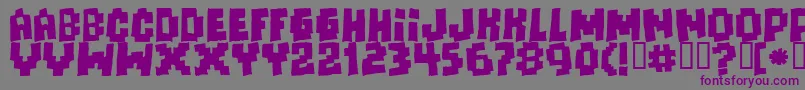 Шрифт Freaksofnaturemassive – фиолетовые шрифты на сером фоне