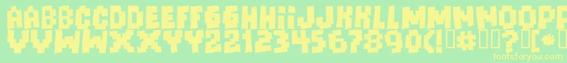 Freaksofnaturemassive Font – Yellow Fonts on Green Background