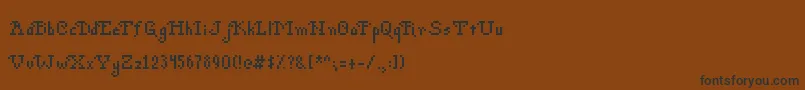 fuente PohPixels – Fuentes Negras Sobre Fondo Marrón