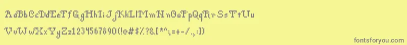 Czcionka PohPixels – szare czcionki na żółtym tle