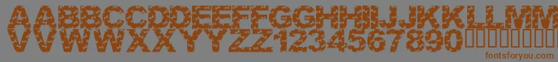 LmsCutItOut Font – Brown Fonts on Gray Background