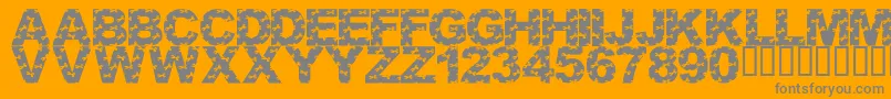 LmsCutItOut-Schriftart – Graue Schriften auf orangefarbenem Hintergrund