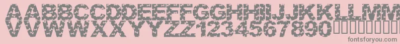 フォントLmsCutItOut – ピンクの背景に灰色の文字