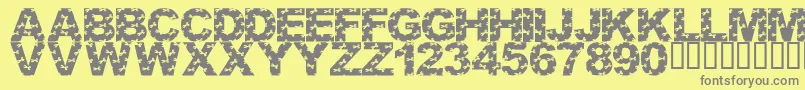 Weitere Informationen zur LmsCutItOut-Schriftart LmsCutItOut-Schriftart – Graue Schriften auf gelbem Hintergrund