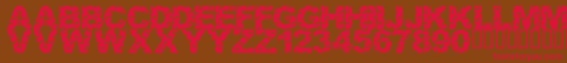 LmsCutItOut Font – Red Fonts on Brown Background