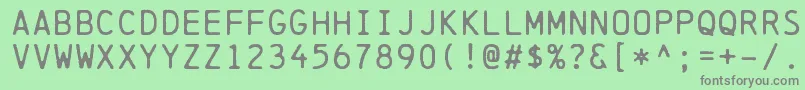 フォントChainprinterRegular – 緑の背景に灰色の文字