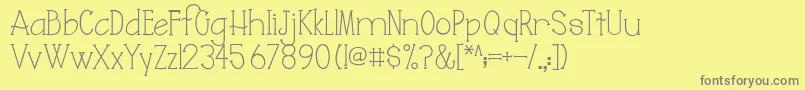 AustieBostJuliana-Schriftart – Graue Schriften auf gelbem Hintergrund