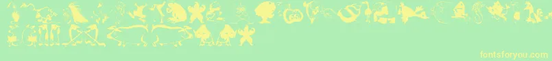 Animalcomedians Font – Yellow Fonts on Green Background