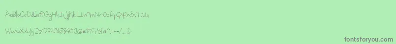 AppleCiderDaydreams-Schriftart – Graue Schriften auf grünem Hintergrund