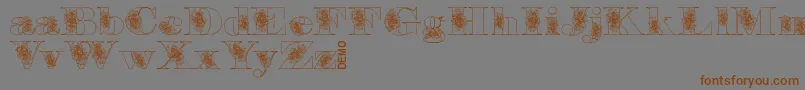 Floryandemo-Schriftart – Braune Schriften auf grauem Hintergrund