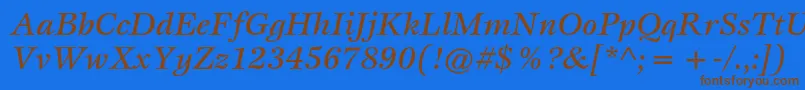 フォントEspritstdMediumitalic – 茶色の文字が青い背景にあります。