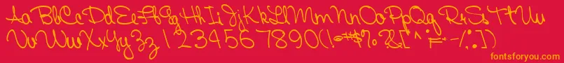 Fairtrade53Bold-Schriftart – Orangefarbene Schriften auf rotem Hintergrund