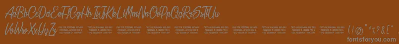 Stardust Font – Gray Fonts on Brown Background