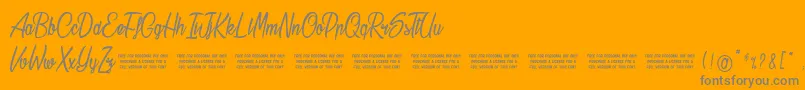 Stardust Font – Gray Fonts on Orange Background