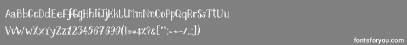 Nikolaidishand Font – White Fonts on Gray Background