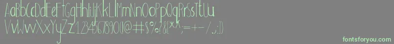 Adouliss Font – Green Fonts on Gray Background