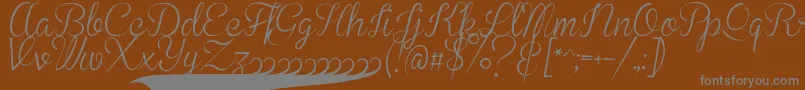BrannbollSmal-fontti – harmaat kirjasimet ruskealla taustalla