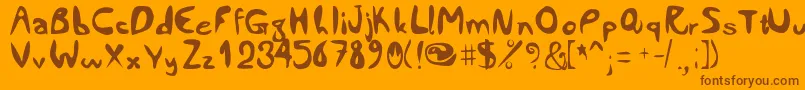 Comiccity Font – Brown Fonts on Orange Background