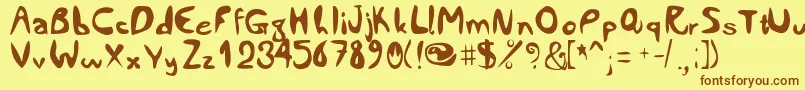 Comiccity Font – Brown Fonts on Yellow Background