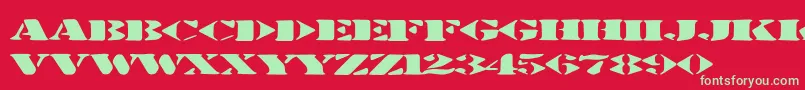 Stenciltration Font – Green Fonts on Red Background