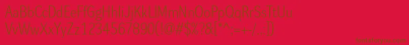Dynagrotesklm-Schriftart – Braune Schriften auf rotem Hintergrund