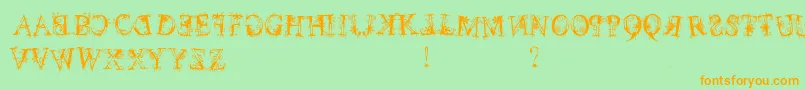 December Font – Orange Fonts on Green Background