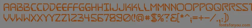 フォントDestructobeamBb – 茶色の文字が灰色の背景にあります。