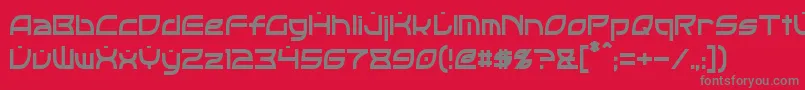 OpticCondensed-fontti – harmaat kirjasimet punaisella taustalla