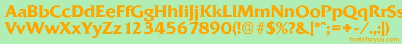 フォントQuadratserialBold – オレンジの文字が緑の背景にあります。