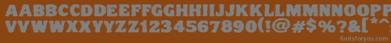 Шрифт Vtcnightofthedrippydeadfatcaps – серые шрифты на коричневом фоне