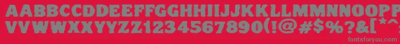 Vtcnightofthedrippydeadfatcaps-fontti – harmaat kirjasimet punaisella taustalla