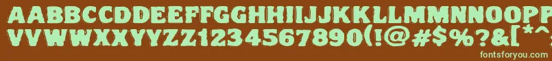 フォントVtcnightofthedrippydeadfatcaps – 緑色の文字が茶色の背景にあります。