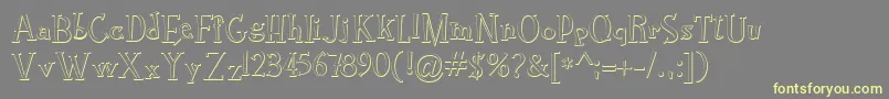 RocknrollTypoBevel-fontti – keltaiset fontit harmaalla taustalla