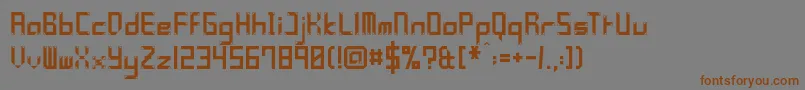 フォントYleePolymniaFramed – 茶色の文字が灰色の背景にあります。