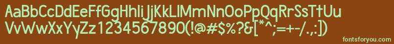 Fonte WumbologySemibold – fontes verdes em um fundo marrom