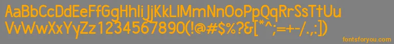 フォントWumbologySemibold – オレンジの文字は灰色の背景にあります。