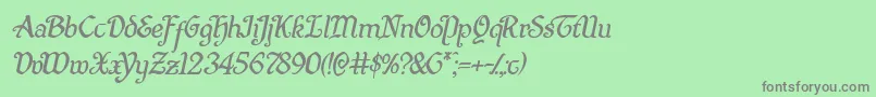 フォントQuillswordital – 緑の背景に灰色の文字