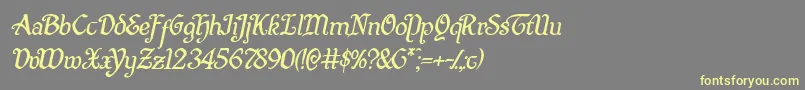 Quillswordital Font – Yellow Fonts on Gray Background