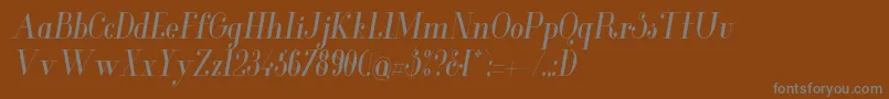 GlamorCondenseditalic Font – Gray Fonts on Brown Background
