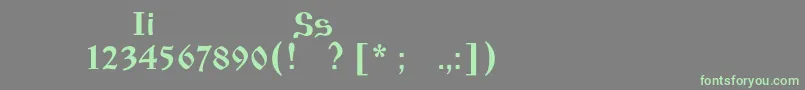 フォントIzhitsaos – 灰色の背景に緑のフォント
