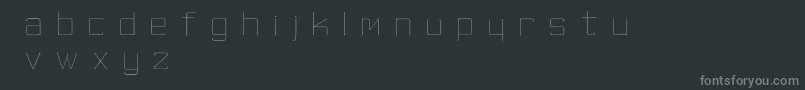 フォントSkinnyMinnie – 黒い背景に灰色の文字