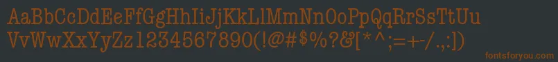 KeyboardCondensedaltSsiCondensedAlternate-Schriftart – Braune Schriften auf schwarzem Hintergrund
