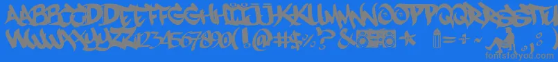 フォントMestizosUnidosUrbanHookupz – 青い背景に灰色の文字