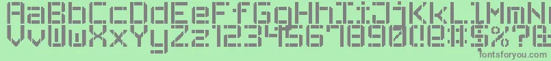 Czcionka StencilPixel7 – szare czcionki na zielonym tle