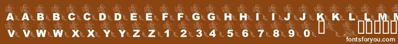 フォントLmsPartOfTheFontWorld – 茶色の背景に白い文字