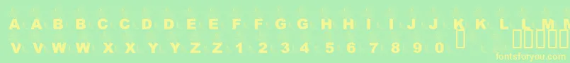 Fonte LmsPartOfTheFontWorld – fontes amarelas em um fundo verde